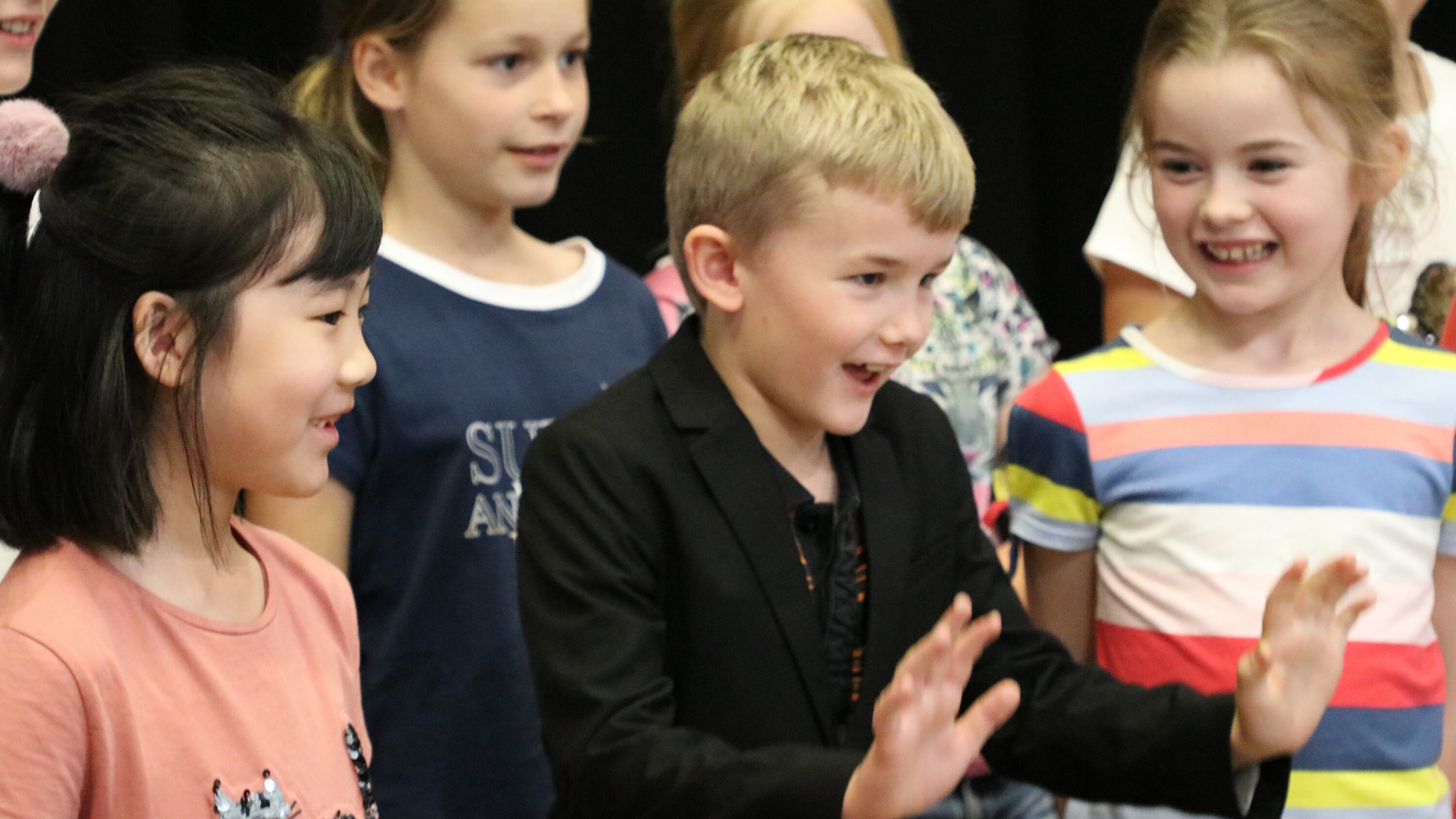 Primary School children attending a drama workshop